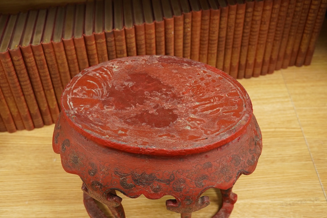 A Chinese red lacquer stand, 24.5cm high